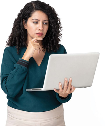 When Payroll Gets Weird, Stop Guessing and Look at the History Woman staring pensively at laptop computer she holds in her hand.